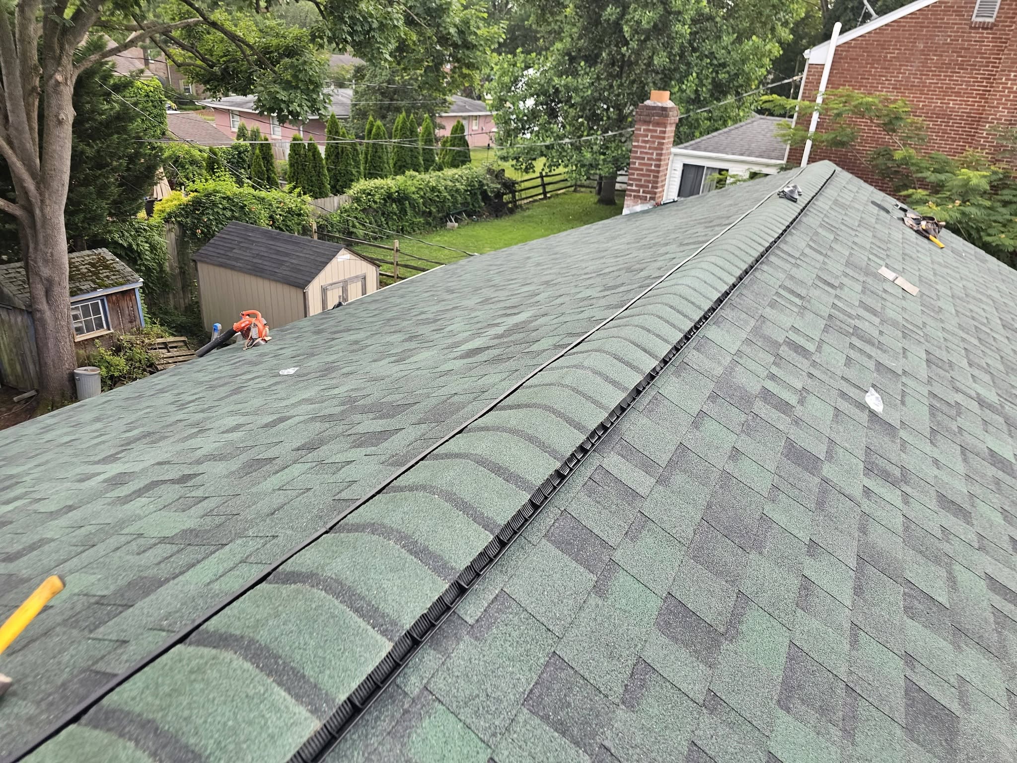 Completed shingle roof from above