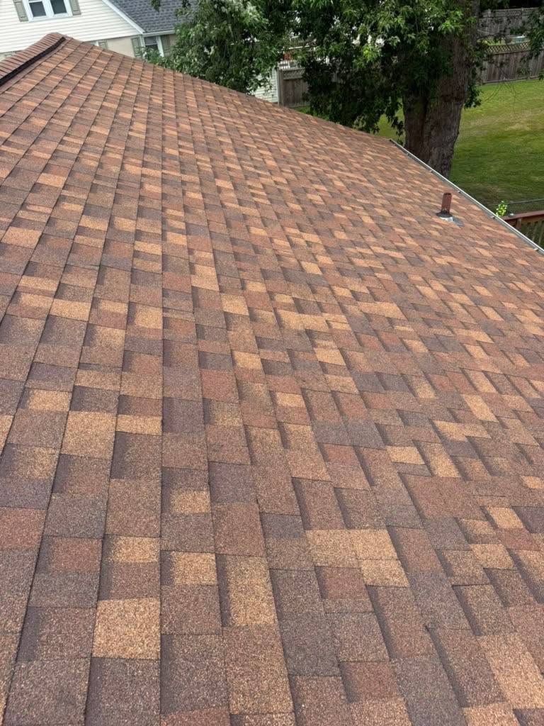 Finished shingle ridge photographed from the roof